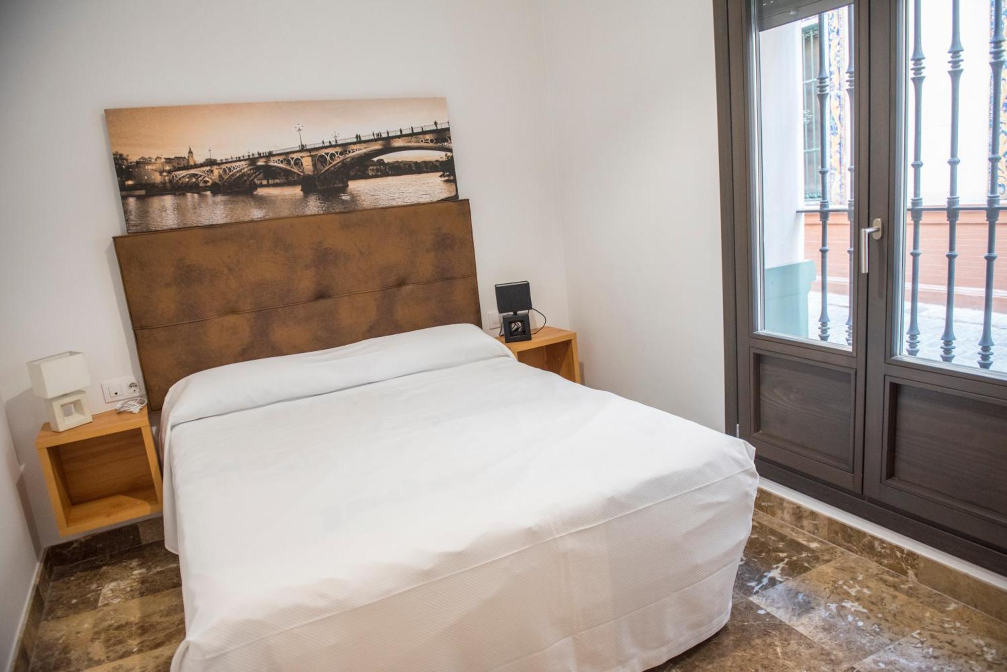 Apartamentos Luxury Puente De Triana Sevilha Exterior foto
